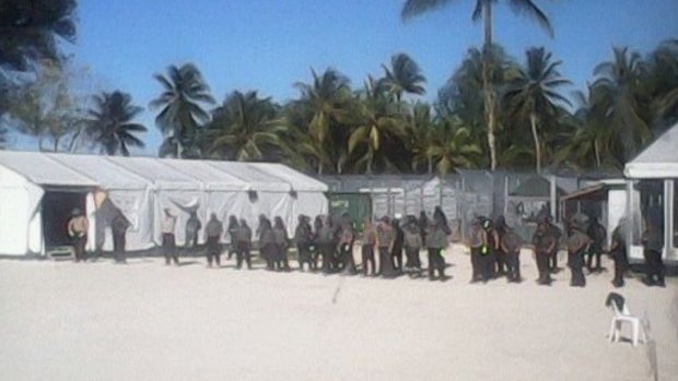 Security staff entering Delta compound on Manus Island detention centre.