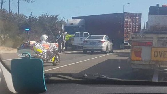 Ute rollover causes Kwinana Freeway traffic chaos