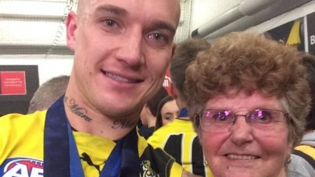 Dustin Martin with his Nan Lois Knight after Richmond's win on Saturday.