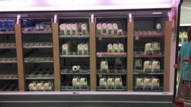 A photo showing brand label milk running low at Coles.  