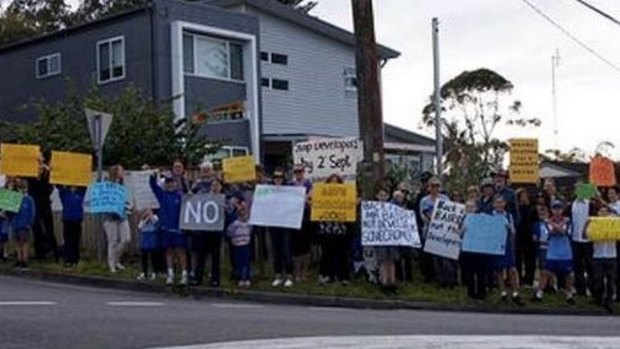 Residents protesting against a planned boarding house gather in Cromer.