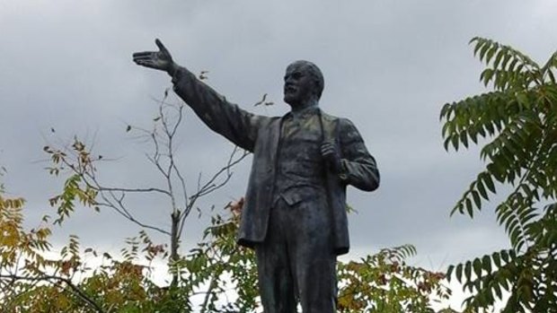 Lenin "hailing a taxi" at Memento Park, Budapest.
