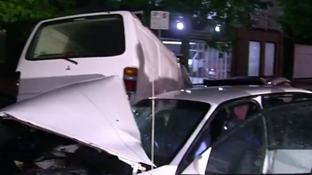 The white Commodore involved in the smash in Southbank. The car was involved in a high-speed chase with police that saw several cars, a van and motorcycle damaged.