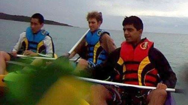 A screenshot of the three men captured kayaking in the GoPro footage. 