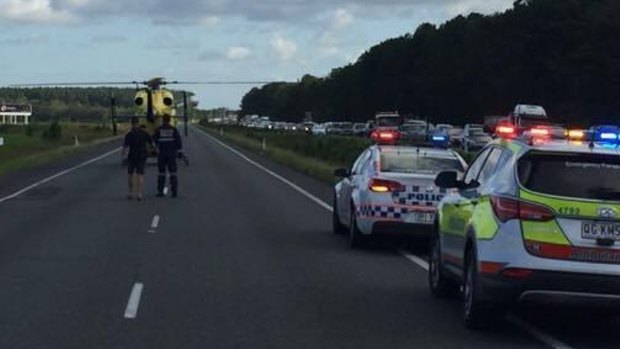 A man has suffered serious head injuries after a car rollover on the Bruce Highway.