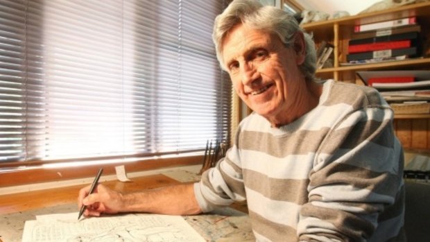 Cartoonist Murray Ball at his desk at his Gisborne home.