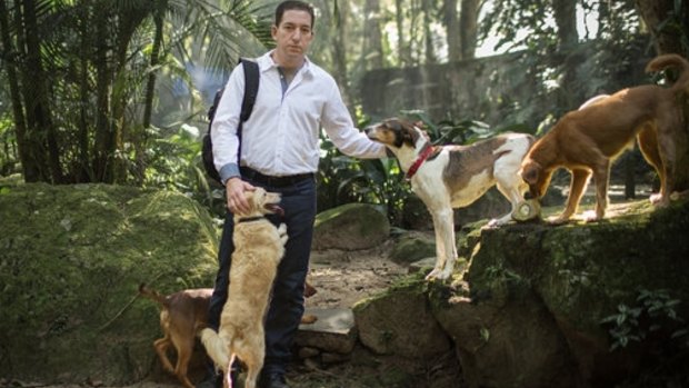 Glenn Greenwald, who broke the Edward Snowden story, with his dogs, near his home in Brazil. 
