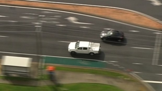 A suspected stolen white ute drives through the Gold Coast hinterland after evading police.