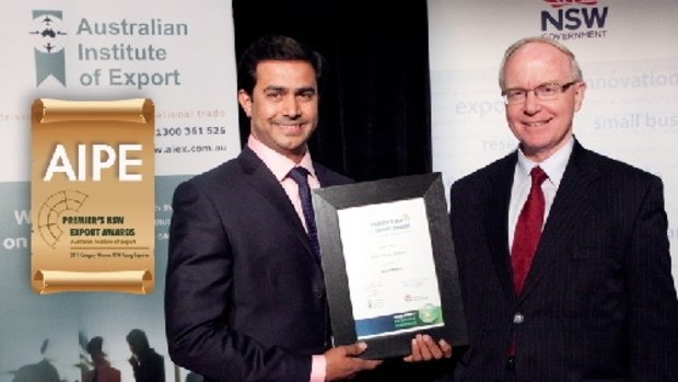 AIPE  chief executive Amjad Khanche accepting an award from the NSW government.