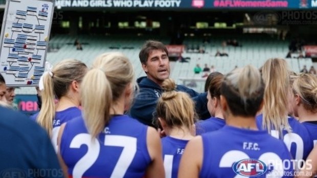 Craig Starcevich, coaching the Western Bulldogs women's team in an exhibition game.