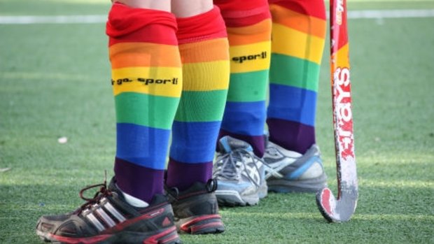 Hockey players wear rainbow socks during the "Fair go, sport!" campaign. 