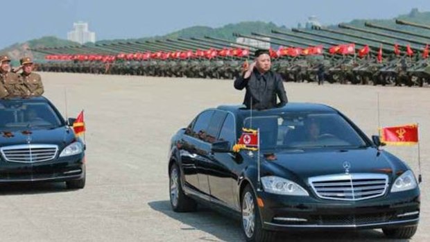 North Korean dictator Kim Jong-un reviews a vast array of cannons before Tuesday's live fire exercise at Wonsan.