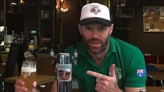 Nathan Rundle with his Aussie brew.