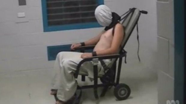 A teenage Dylan Voller had a hood placed over his head and was strapped to a chair at the Don Dale Detention Centre.