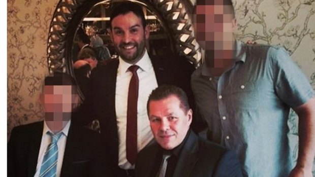 Liverpool councillor Peter Ristevski is accused of blackening the party's name, including by associating with a convicted drug dealer nicknamed "The Falcon" whose real name is Tony Atanasovski, seated.