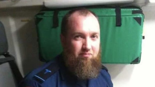 Adam Brookman pictured on a Facebook page wearing what appears to be an Ambulance Victoria graduate paramedic uniform..