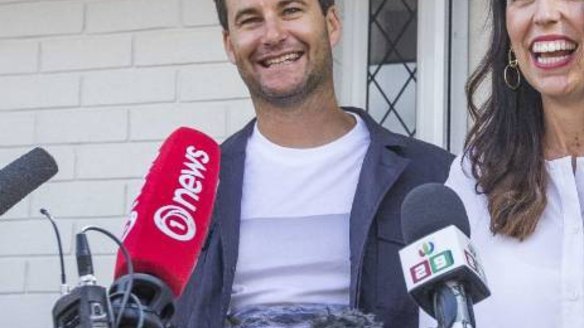 New Zealand's Prime Minister Jacinda Ardern, right, with her partner Clarke Gayford speaks to journalists in front of home in Auckland, New Zealand Friday, Jan. 19, 2018. Ardern announced on Friday that she is expecting her first child in June. Photo: JASON DORDAY/STUFF