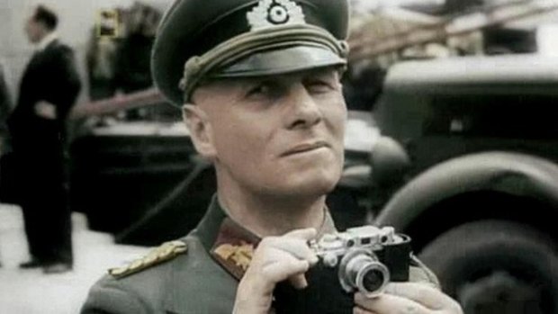 In this colourised screen grab from the documentary series The World at War, German Field marshal Erwin Rommel with his Leica III rangefinder camera. 