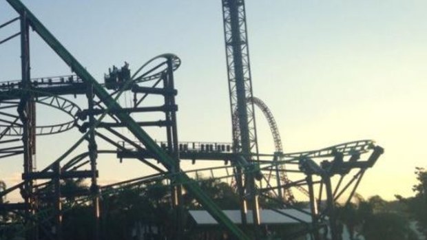 A number of people were stranded on Movie World's Green Lantern ride when an "an issue with a wheel" brought two carriages to a sudden halt.