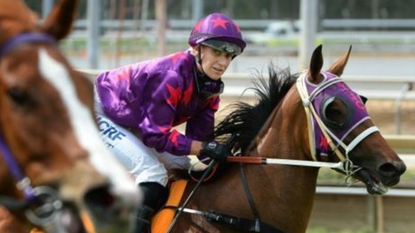 Carly Mae-Pye in action on the racetrack. 