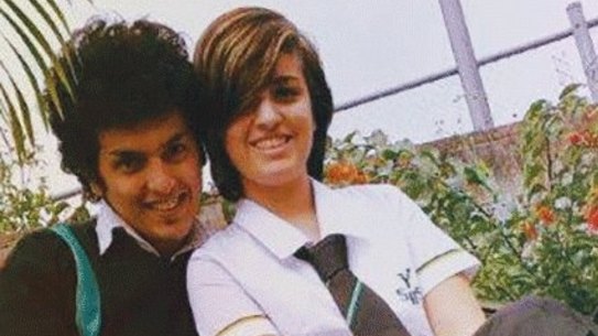 Mojgan was very proud when she started school in Australia and could finally wear a uniform. Pictured with Milad Jafari at Yeronga State High School.