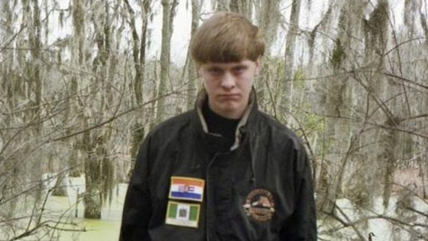 Alleged Charleston gunman ... A picture on Dylann Roof's Facebook page showed the 21-year-old wearing a black jacket with patches of the apartheid-era South African flag and the flag of white-ruled Rhodesia, which is now part of Zimbabwe. 