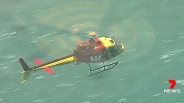 A helicopter conducting shark patrols along Jan Juc and Torquay beaches.