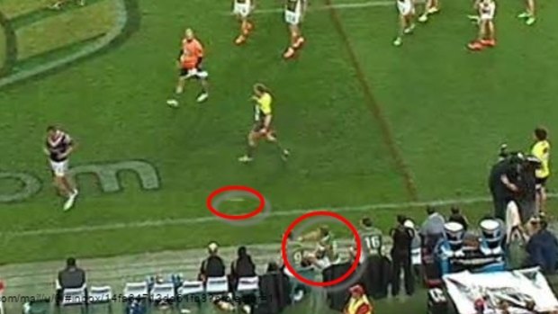 Bottle incident: George Burgess, right, and the bottle are circled. 