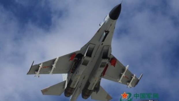 A People's Liberation Army J-11 fighter on exercises over the South China Sea.