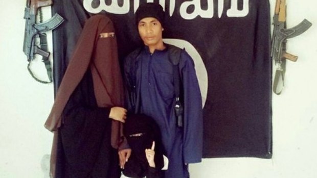 Malaysian police say  Muhammad Wanndy Mohamad Jedi (right) has been using social media to recruit Malaysians and plot terrorist attacks.