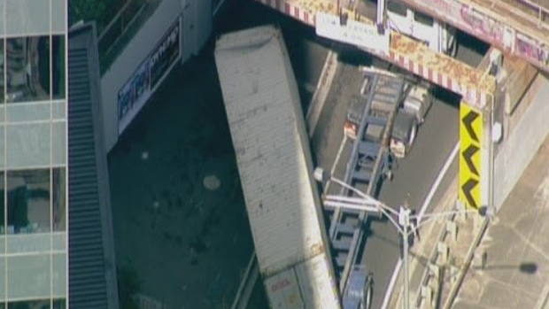 A truck has hit an overpass in Footscray. 