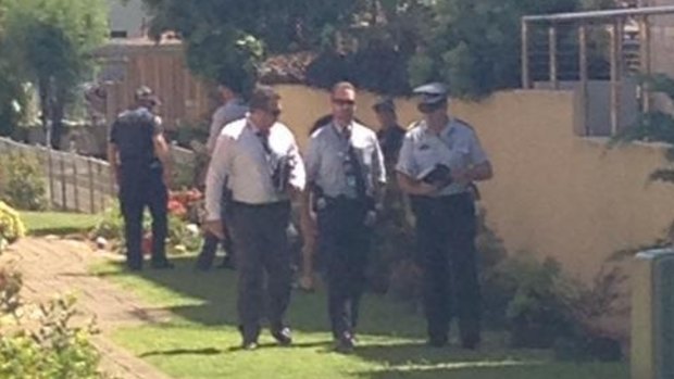 Police have arrested a man following a siege in Biggera Waters.