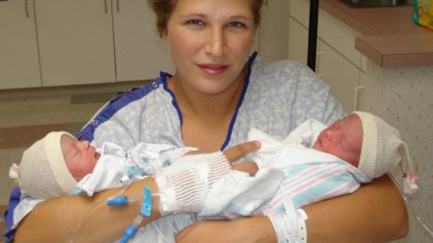 Darlena Cunha with her two daughters soon after their birth.