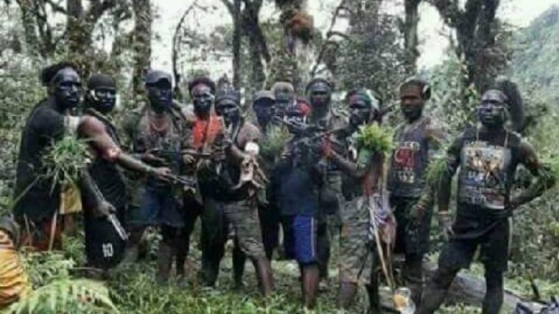 Armed men in Papua province, who are said to be among the people blockading two villages that service the Freeport gold-copper mine.