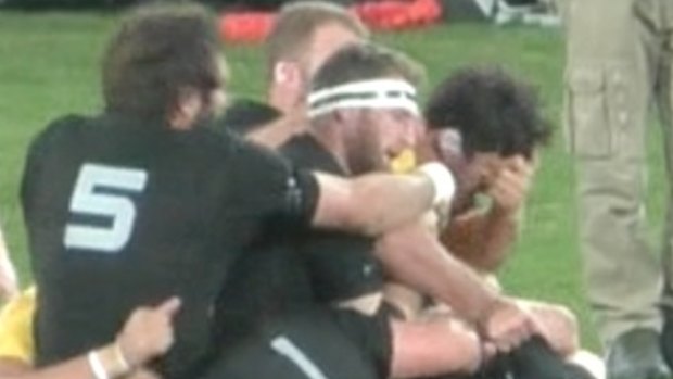 No charge: Owen Franks appears to gouge the eye of Kane Douglas.