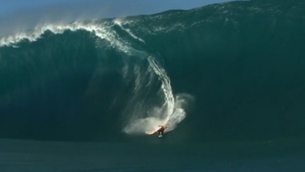 Niccolo Porcella before his wipe out on a monster wave in Teahupoo. 