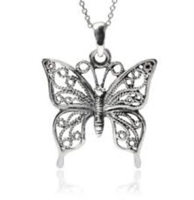 The butterfly pendant found on Marnielee Cave's body. 