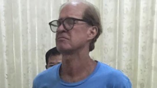 Australian filmmaker James Ricketson in custody in Phnom Penh.