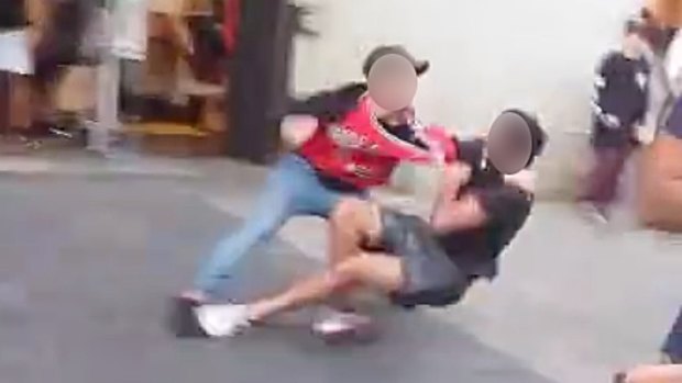 Footage has emerged online on Tuesday of a group of males brawling on Murray Street just metres from shop-fronts.