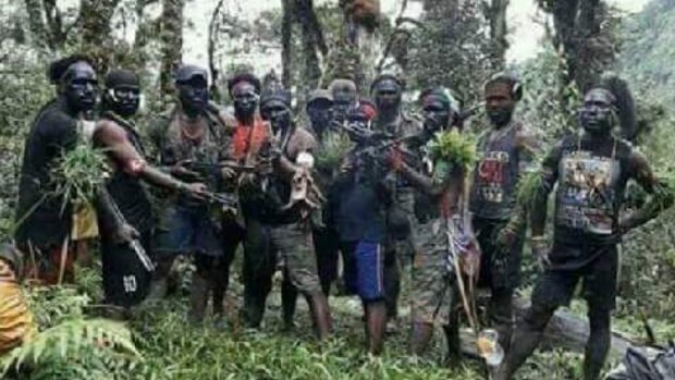 Armed men in Papua province who are said to be among those blockading two villages that service the Grasberg mine.  