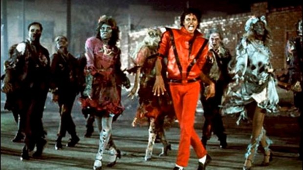 Michael Jackson (in orange) in the music video <i>Thriller</i>, which turned into a surprise success for director John Landis. 