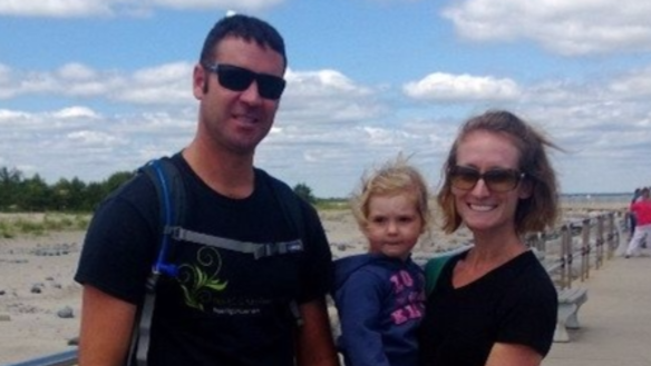 Austin and Janette Desi with their daughter Evelyn. Mrs Desi is full-term with the couple's second child, a boy.