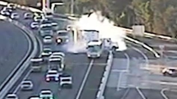 Traffic cameras captured the moment a truck braked heavily to avoid hitting a school bus.