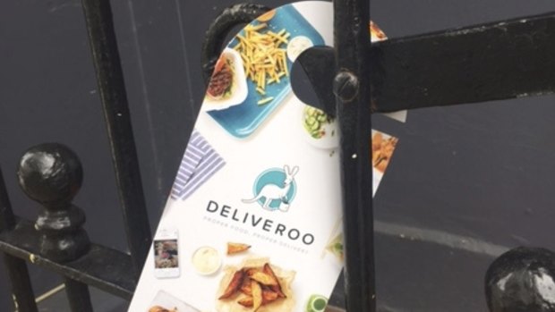 Deliveroo flyers illegally placed on doorknobs in Bondi Junction.