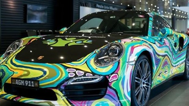 The Porsche was customised with a vinyl wrap designed by artist Merry Sparks.
