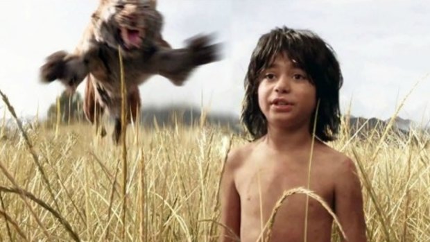 Shere Khan confronts Mowgli (Neel Sethi) in <i>The Jungle Book</i>.