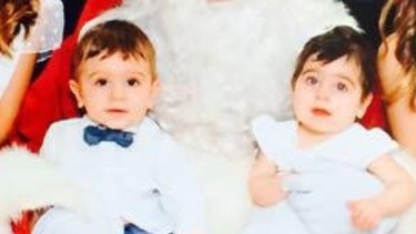 The twins, pictured last Christmas, were found unconscious in a pool in Kellyville Ridge.