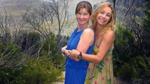 Childhood friends Cindy Waldron, left, who was dragged underwater by a crocodile, and Leeann Mitchell, who tried to save her.