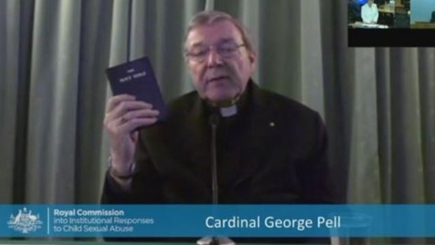 Cardinal George Pell testifies at the hearing in Rome.