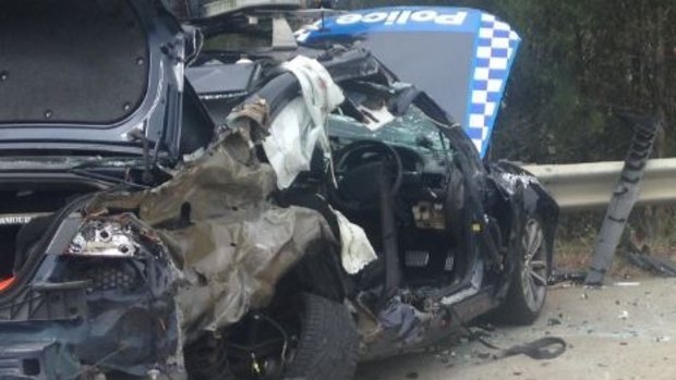 A police car was crumpled in an accident with a truck on the Pacific Motorway near the Helensvale exit.